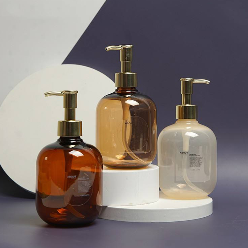 300ml 500ml PET Plastikowe Bursztynowe Okrągłe Puste Butelki Na Balsam Do Ciała Złota Butelka Na Balsam PET z Pompką 300ml 500ml PET Plastikowe Bursztynowe Okrągłe Puste Butelki Na Balsam Do Ciała Złota Butelka Na Balsam PET z Pompką