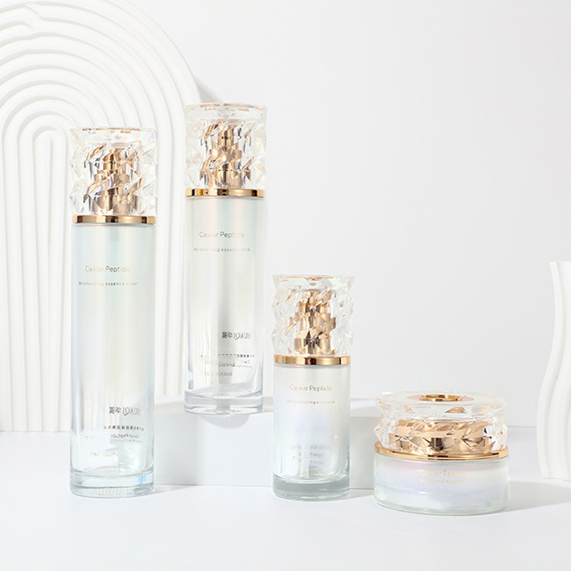 Zestaw opakowań kosmetycznych z kolorowym gradientem. Pusty słoik z kremem do twarzy. Szklana butelka z balsamem do pielęgnacji skóry z pompką