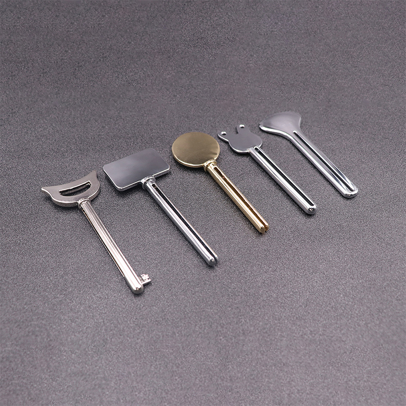 Metalowy dozownik pasty do zębów Środek do mycia twarzy Wyciskacz do tubki pasty do zębów Kształt klucza Wyciskacz do tubek kosmetycznych