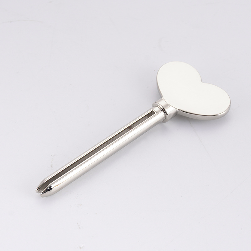 Metalowy dozownik pasty do zębów Środek do mycia twarzy Wyciskacz do tubki pasty do zębów Kształt klucza Wyciskacz do tubek kosmetycznych