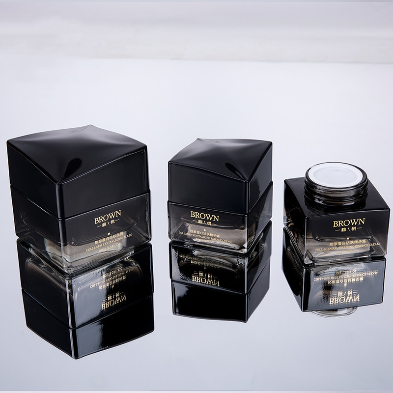 Unikalny kwadratowy szklany słoik z kremem z podwyższoną pokrywką do opakowań kosmetycznych Unikalny kwadratowy szklany słoik z kremem z podwyższoną pokrywką do opakowań kosmetycznych