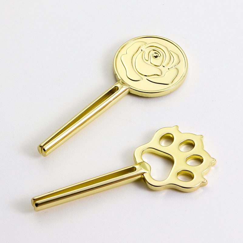 Unikalna konstrukcja wyciskacza do rurek ze stopu cynku w kształcie łapy kota do karmy dla kotów Unikalna konstrukcja wyciskacza do rurek ze stopu cynku w kształcie łapy kota do karmy dla kotów